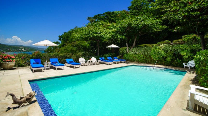 pool with sea in the background