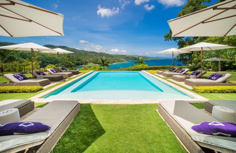 pool with sea in the background