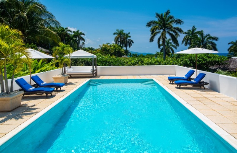 pool with sea in the background