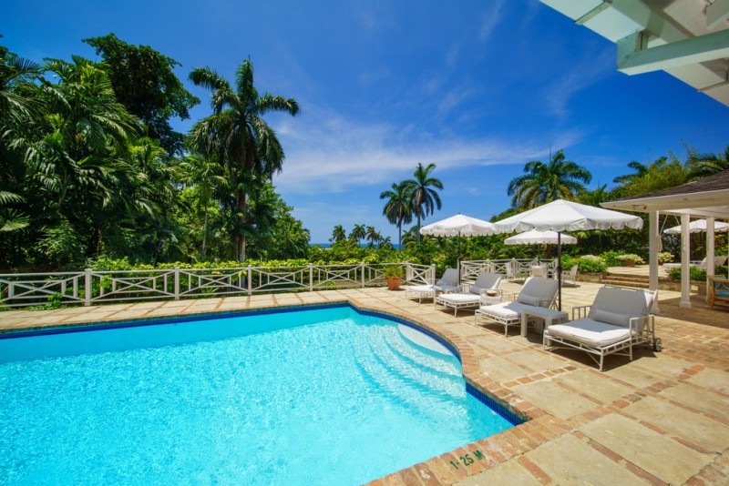 pool with sea in the background