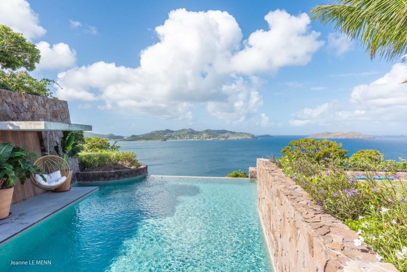 pool with sea in the background