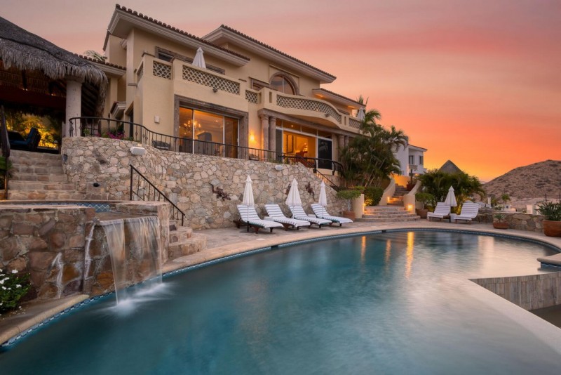 view of the pool area and the villa at Nirvana in Mexico