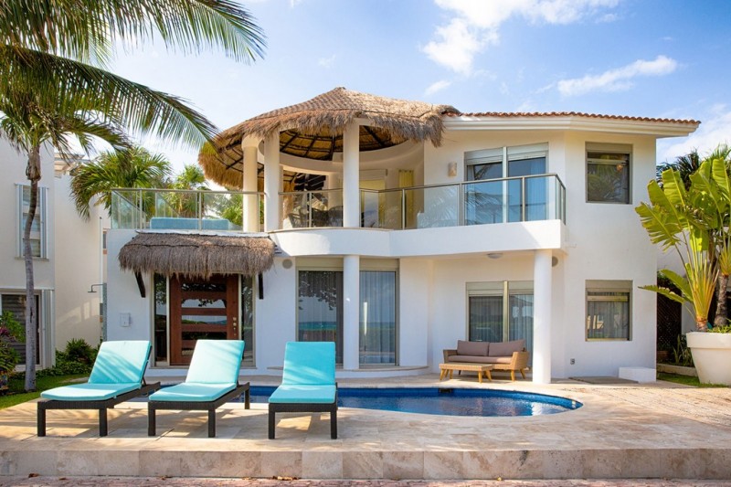 The pool area and view of the villa