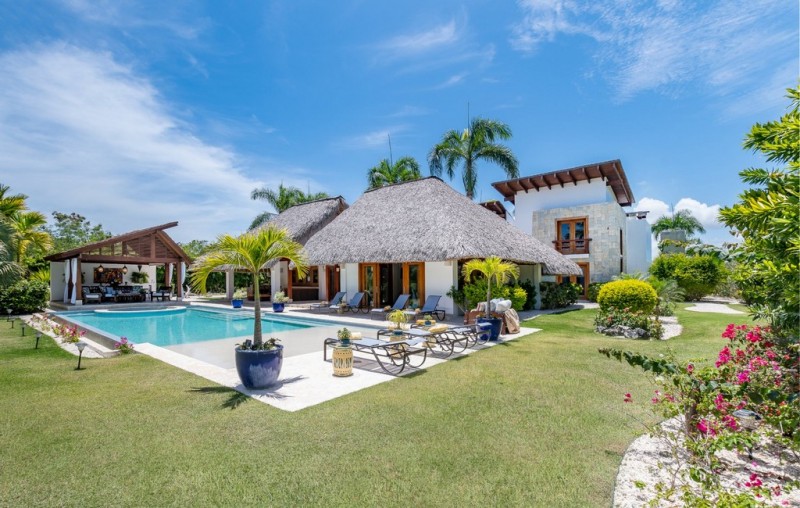View of Yarari 17 Villa from the garden and pool areas in DR