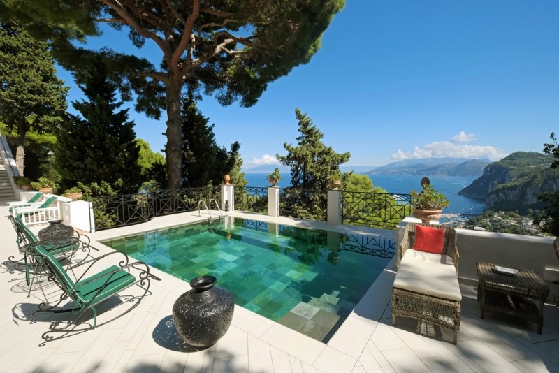 pool with sea in the background