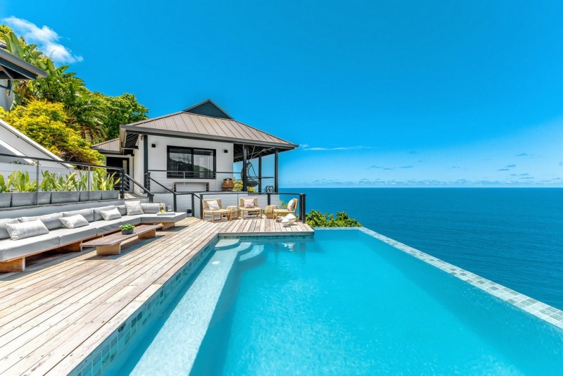 pool with sea in the background