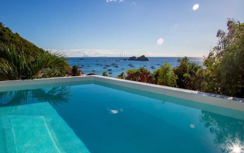 pool with sea in the background