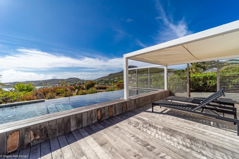 pool with sea in the background
