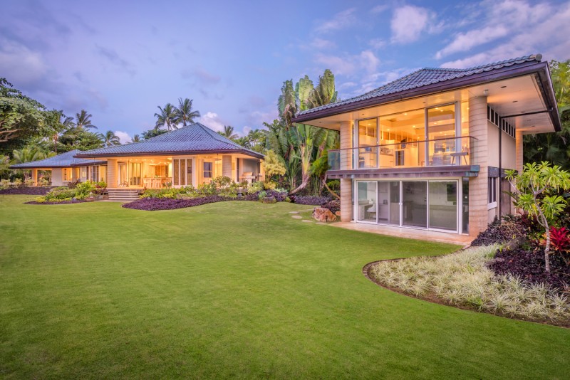 Anini Beach Front Home by twilight & the beautiful manicured