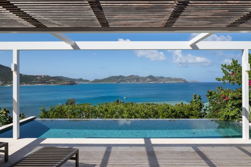 pool with sea in the background