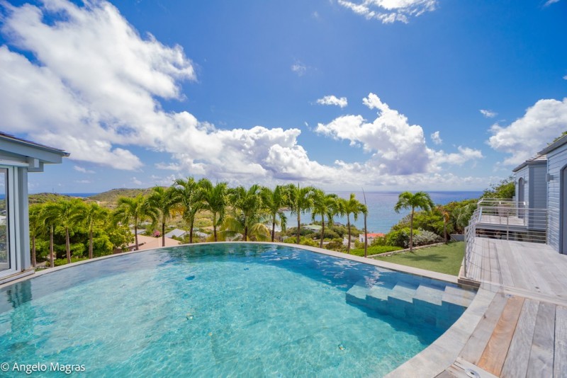 pool with sea in the background
