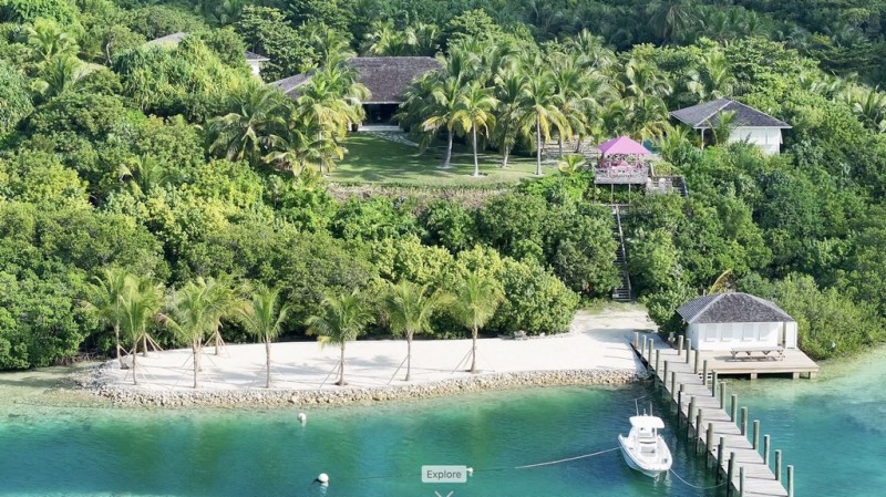 view of private beach dock and house at Beacon Hill Estate