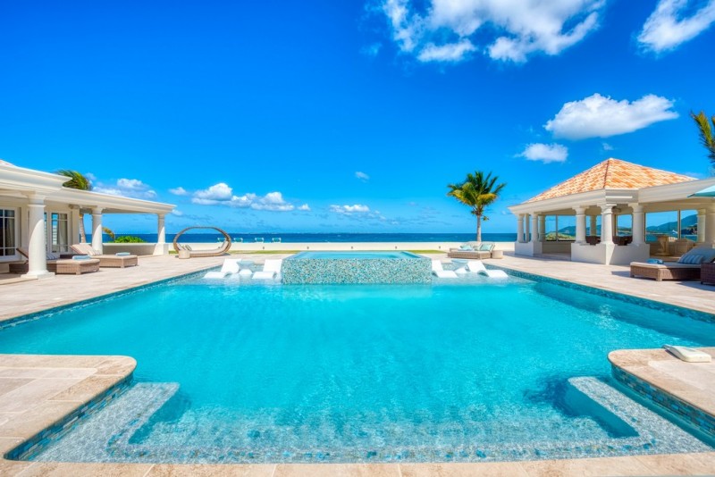 pool with sea in the background