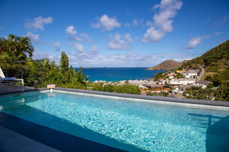 pool with sea in the background