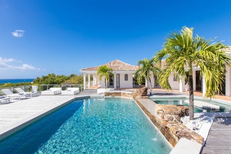 pool with sea in the background