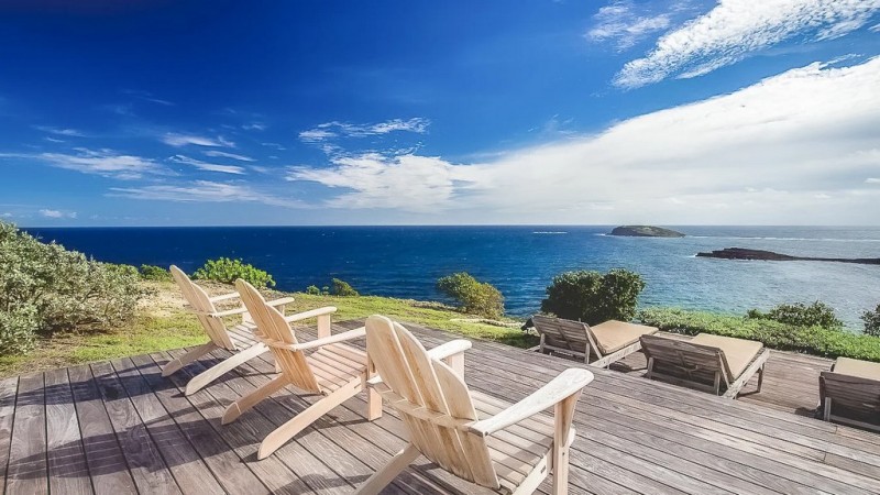 Lovely view of sun loungers,with sea in the background