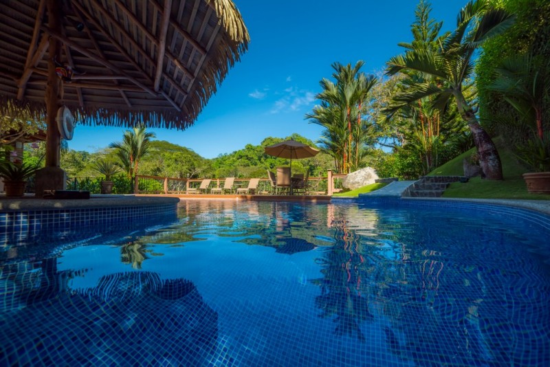 view of villa and pool