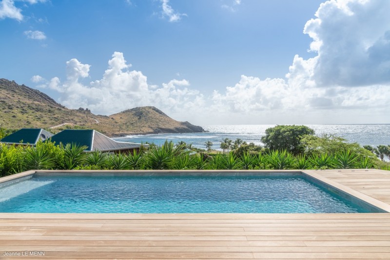 pool with sea in the background
