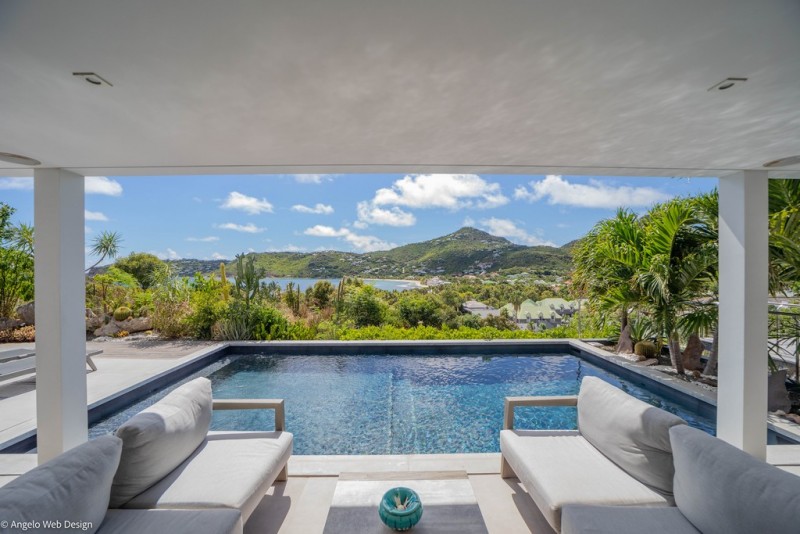 pool with sea in the background