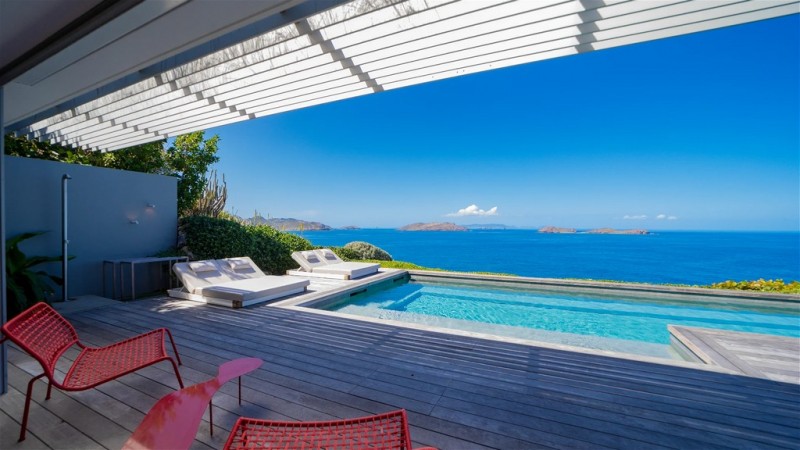 pool with sea in the background