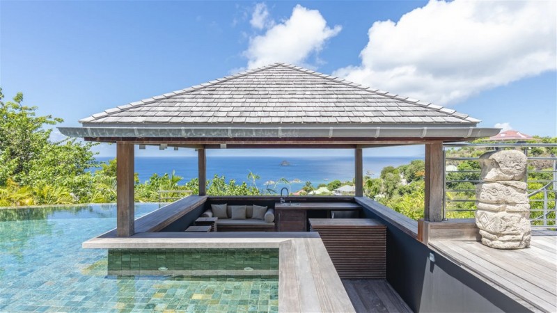 pool with sea in the background
