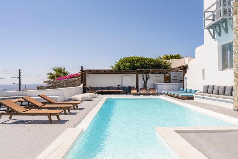 View of Pool with sea in the background