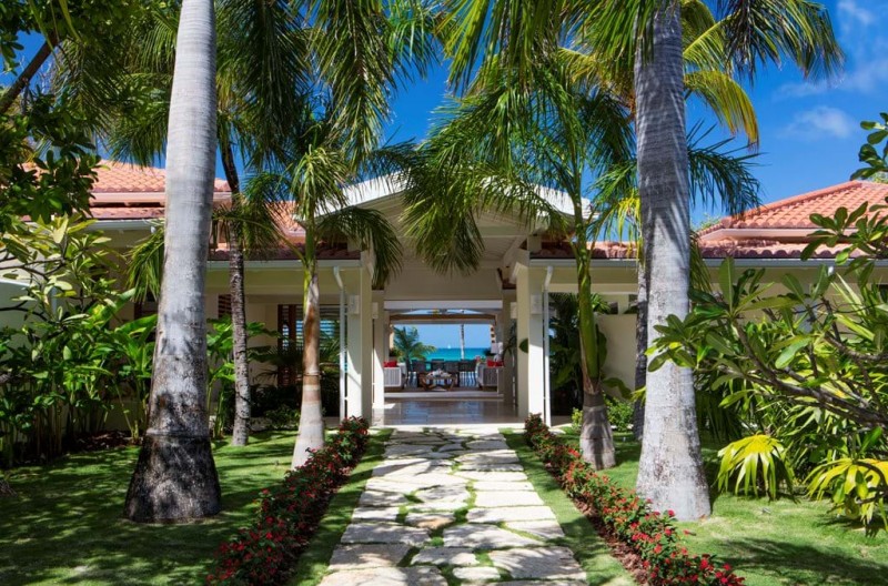 view of villa with sea in the background