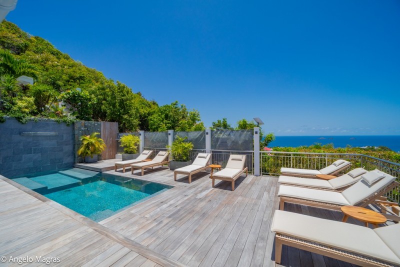 pool with sea in the background