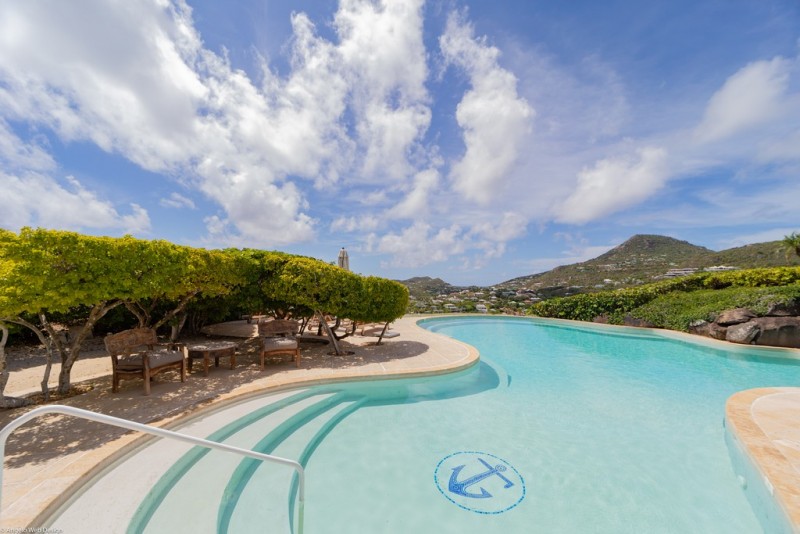 pool with sea in the background