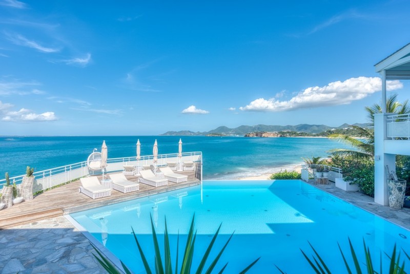 pool with sea in the background