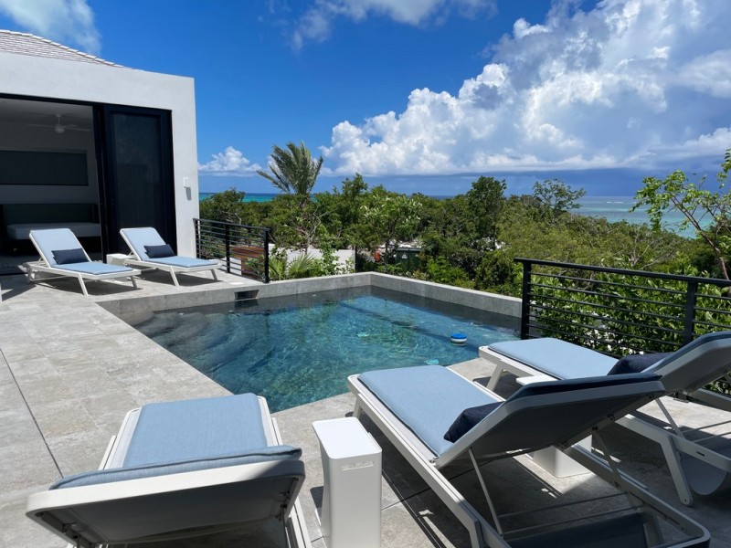 pool with sea in the background