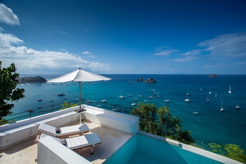 pool with sea in the background