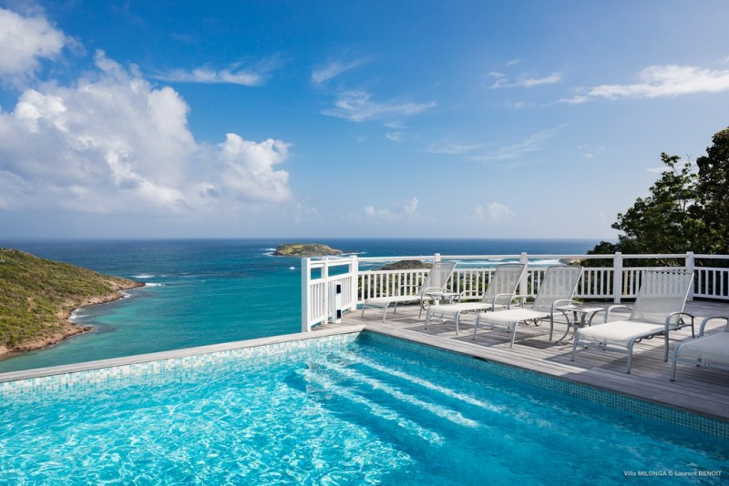pool with sea in the background