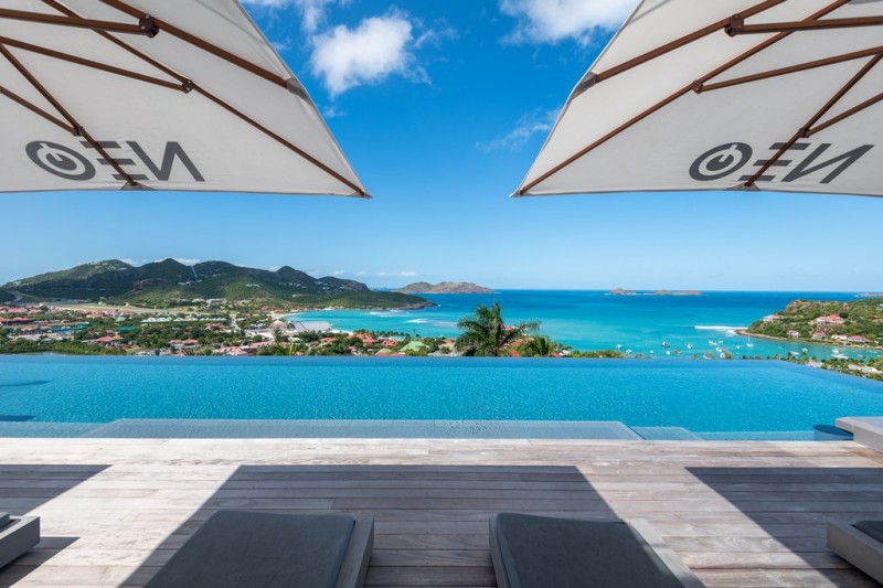 pool with sea in the background