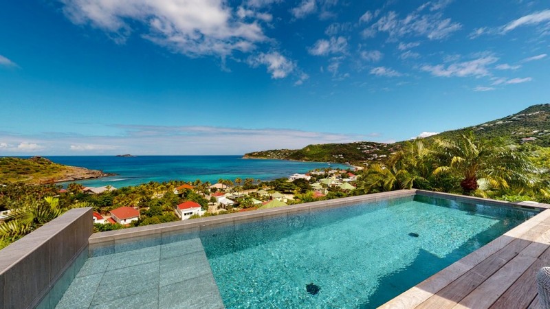 pool with sea in the background