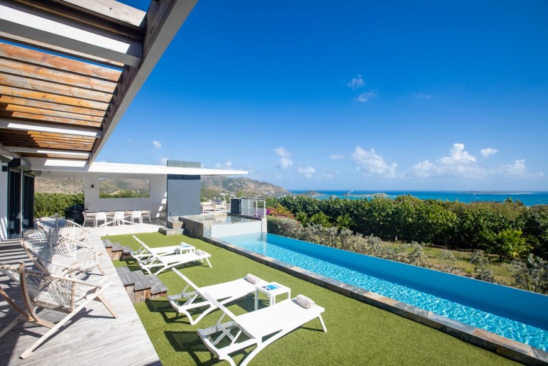 pool with sea in the background