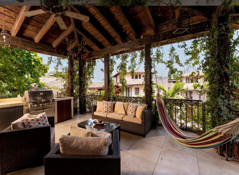 View of terrace with chairs and hammock