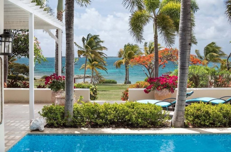 pool with sea in the background