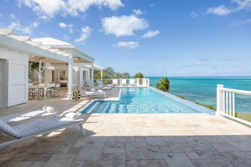 pool with sea in the background