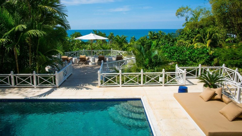 pool with sea in the background