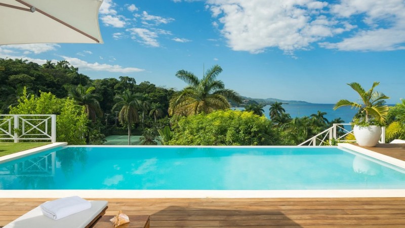 pool with sea in the background
