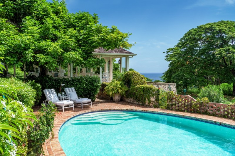 view of villa and pool