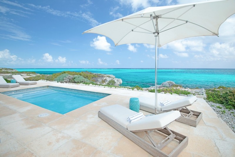 pool with sea in the background