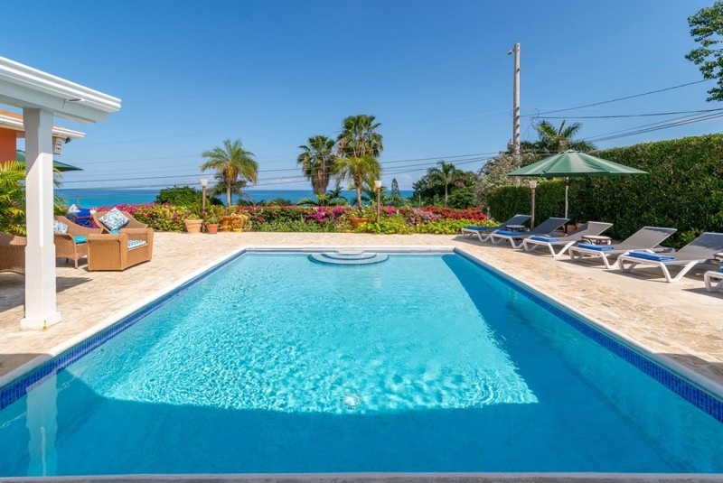 pool with sea in the background