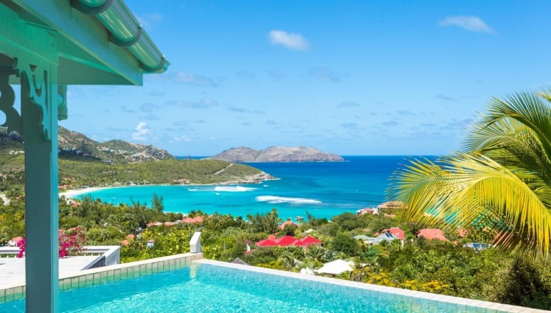 pool with sea in the background