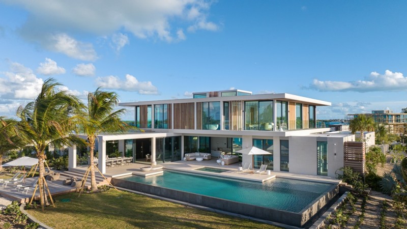view of villa with pool in front