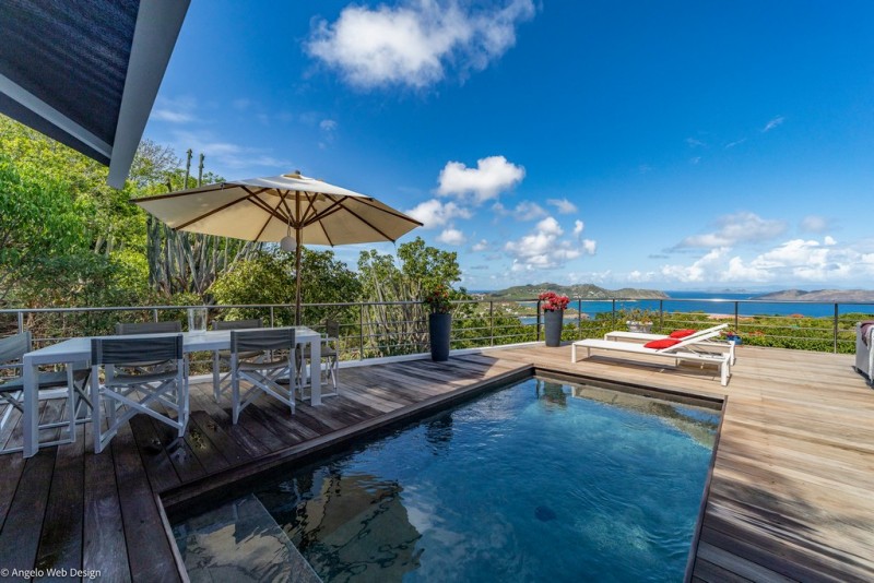pool with sea in the background