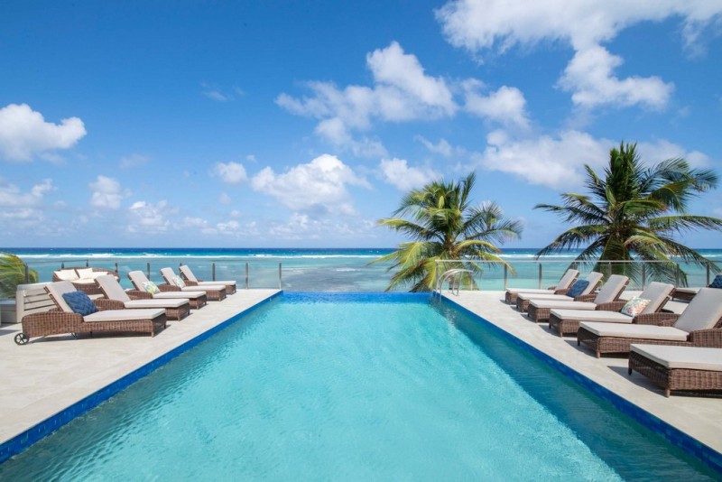 pool with sea in the background