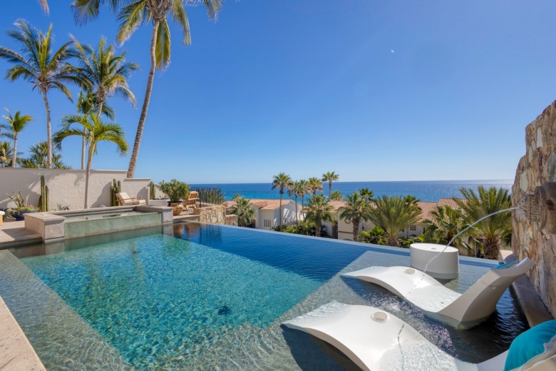 pool with sea in the background