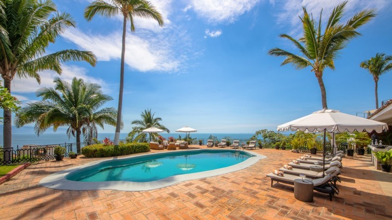 pool with sea in the background